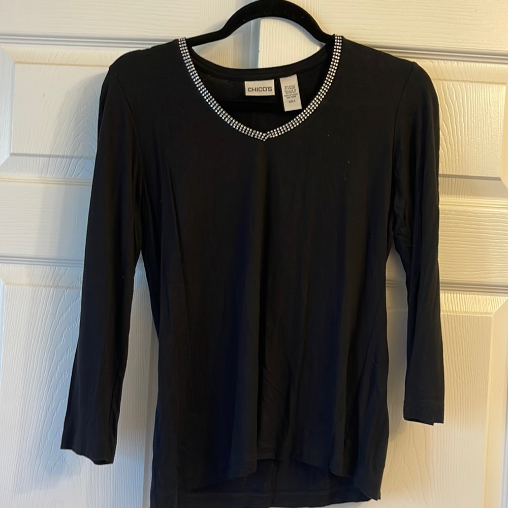 Chico’s black knit top.